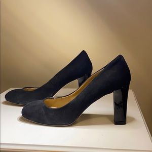 Black suede pumps with patent leather heels